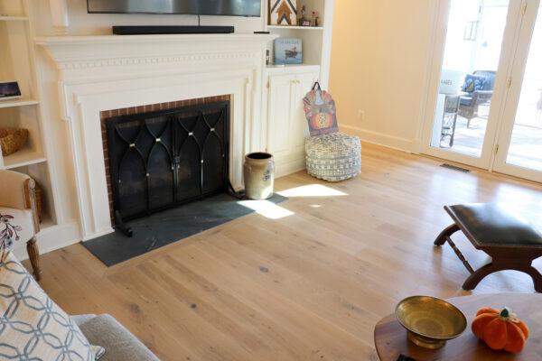 White oak hardwood floor around fireplace. Floor has LED hardwax oil finish
