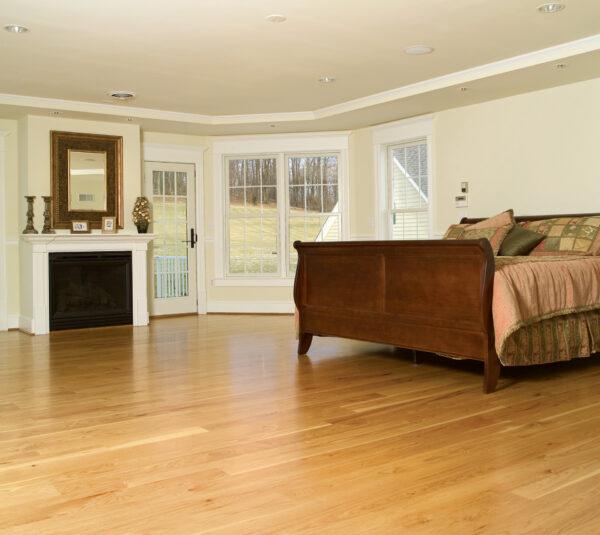 wide plank hickory floor in bedroom