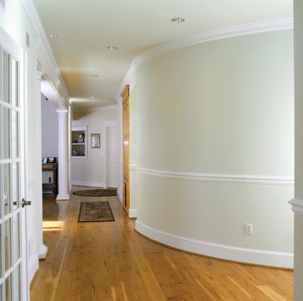 Wide plank hickory flooring in hallway